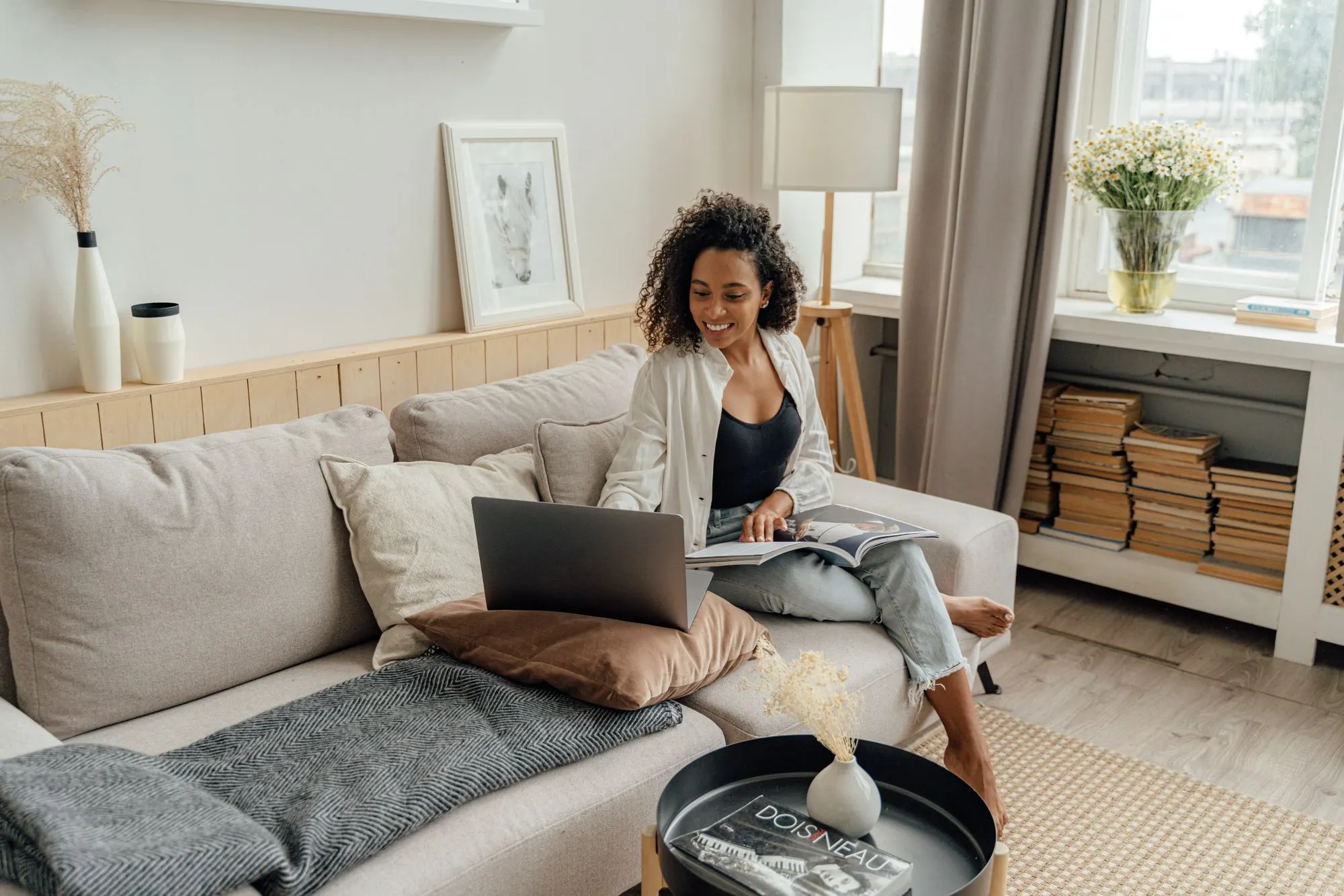 A person researching psychotherapists on a laptop at home